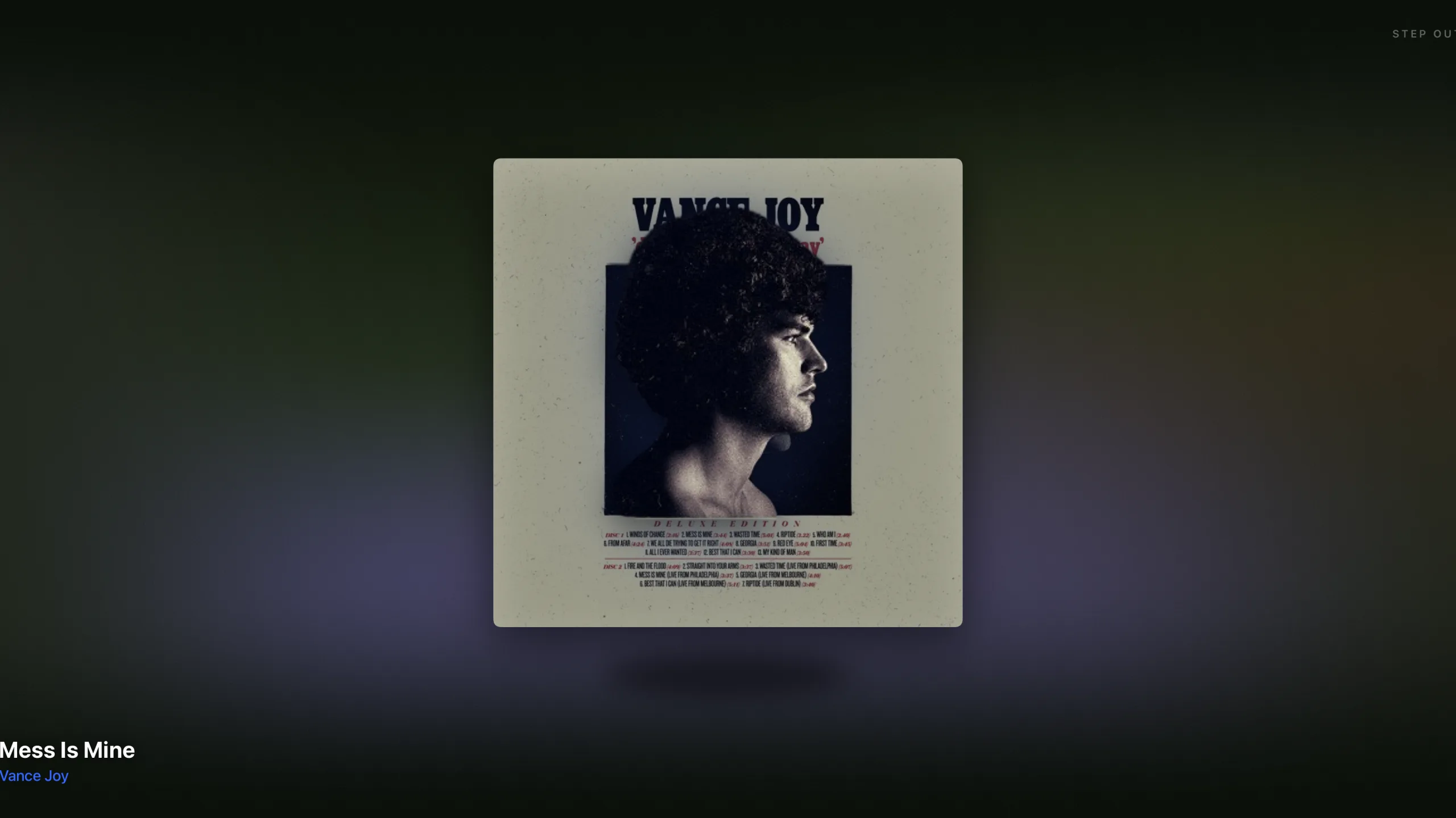 Dial ambient screensaver: the album sleeve floating in soft colored light drawn from the artwork