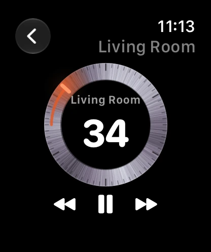 Dial on Apple Watch: the volume dial for the Living Room reading 34, an ember arc tracing the turn